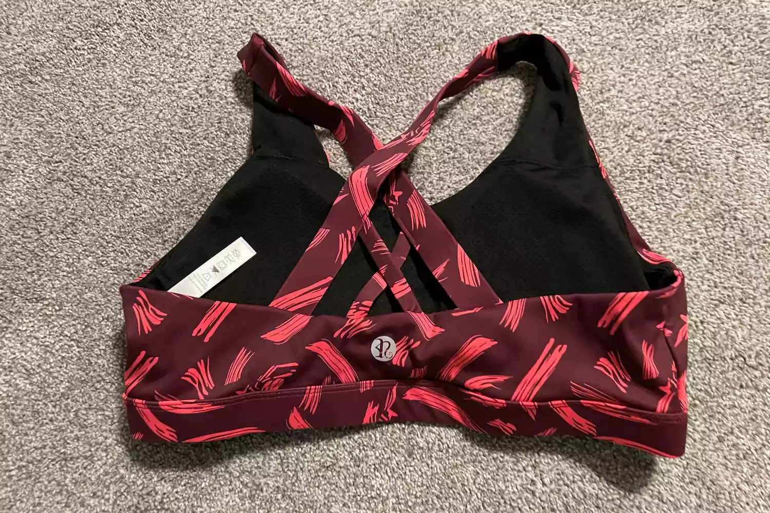 The Running Girl Sports Bra on the floor
